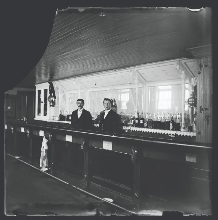 Eldorado Bar ca.1903. The El Dorado, a Dale favorite, had the longest bar in the county. Owner “Bat” Lawson is on left, with bartender Jim Shields on right.