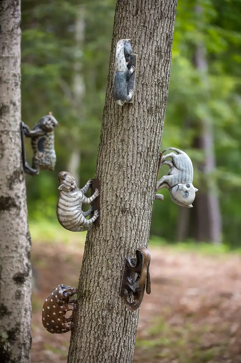 Sergei Isupov, Sculptures in the Trees _ Ceramic Animals, Photo by Eric Limon